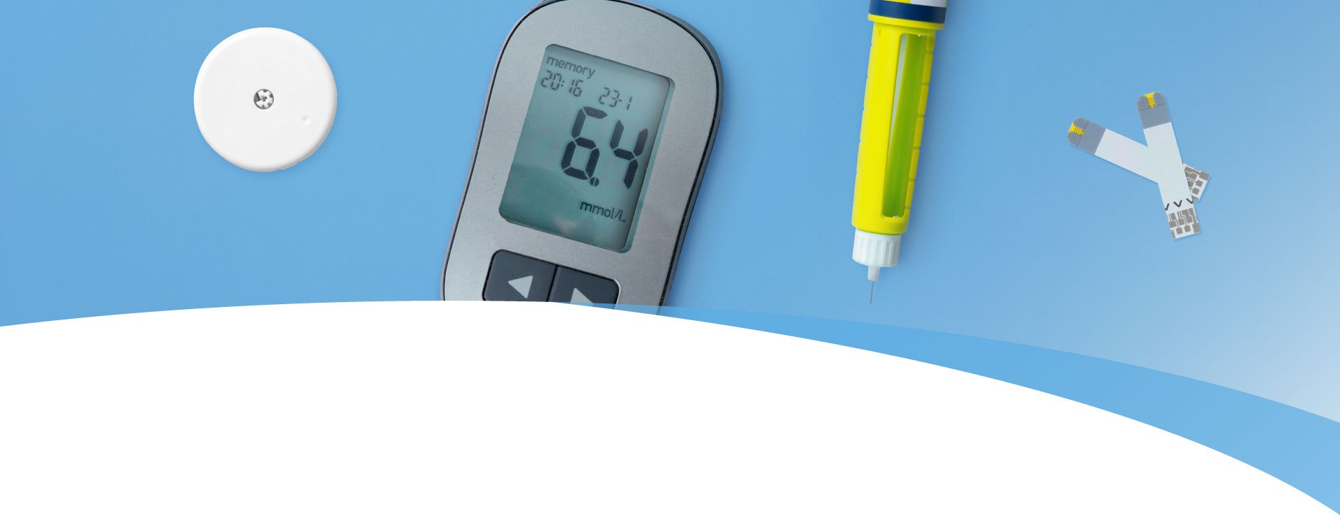 Diabetes supplies and devices on desk. Top view flat lay composition
